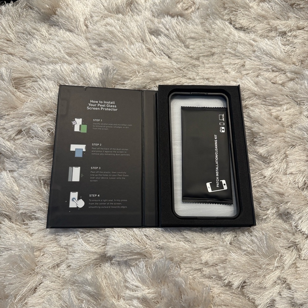 NIB PEEL iPhone 16 Pro Max Glass Screen
Protector